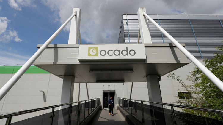 Ocado full-year earnings held back by investment