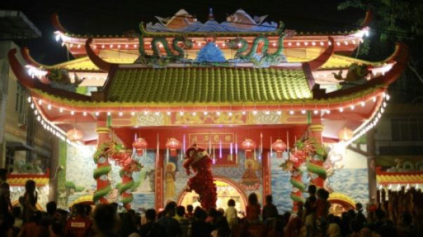Dans le monde entier, les communautés chinoises fêtent l'année du cochon Dans le monde entier, les communautés chinoises fêtent l'année du cochon