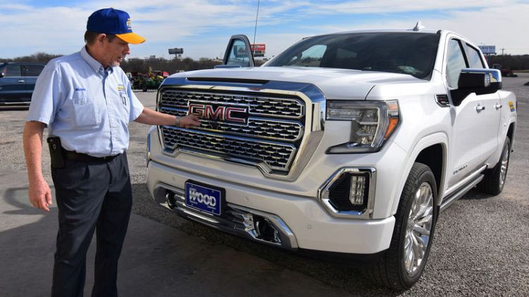 Huge, pricey trucks haul jobs and profits for the Detroit Three