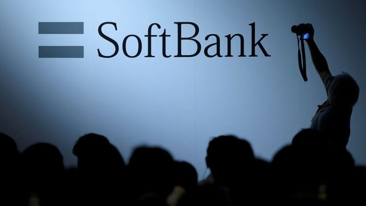 SoftBank Group unveils $5.5 billion stock buyback, third-quarter profit soars 60 percent