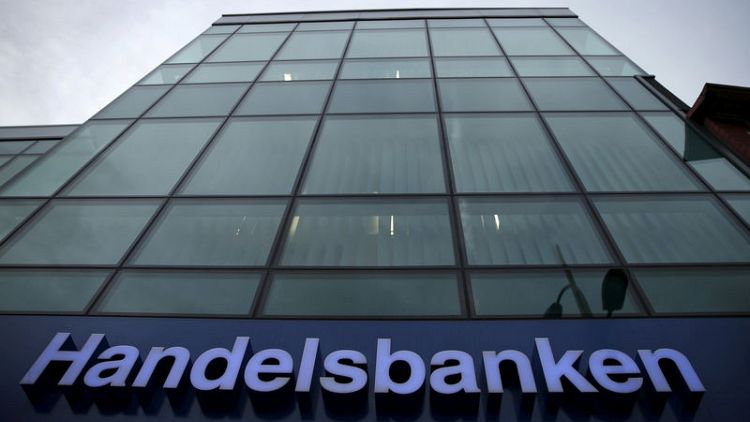 Handelsbanken fourth-quarter profit beats forecast, dividend well below
