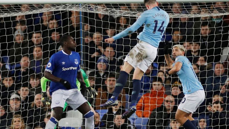 Man City go top of the Premier League with win at Everton