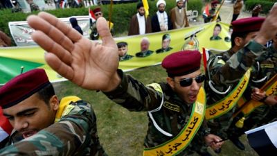La loi ou la force: les groupes armés chiites veulent bouter les Américains hors d'Irak
