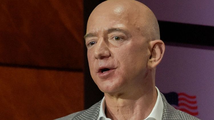 Amazon's Bezos says National Enquirer owner tried to blackmail him