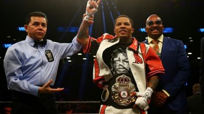 Boxe: Davis expéditif pour conserver son titre WBA des super-plumes