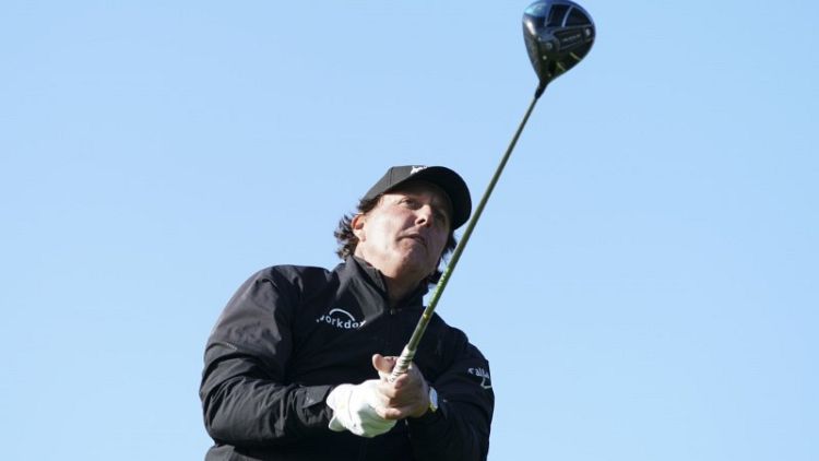 Mickelson leads by three as play halted at Pebble Beach