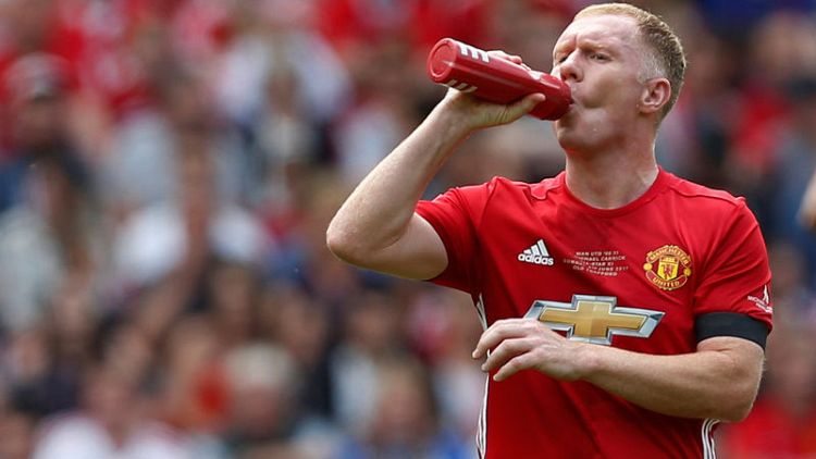 Scholes named Oldham manager