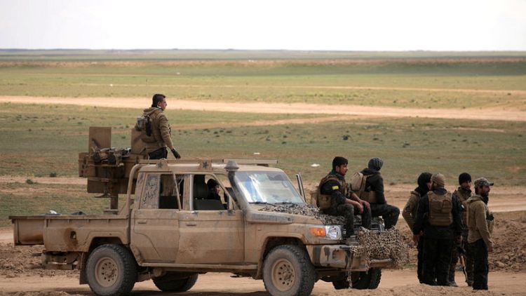 Coalition warplanes hit last Islamic State enclave in eastern Syria