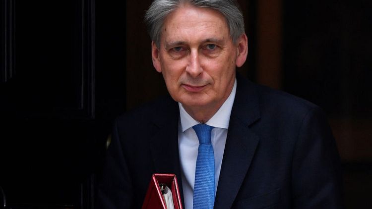 UK budget surplus goal no longer credible - lawmakers