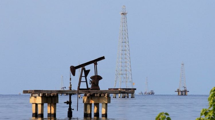 Oil edges up amid OPEC cuts, U.S. sanctions on Iran and Venezuela