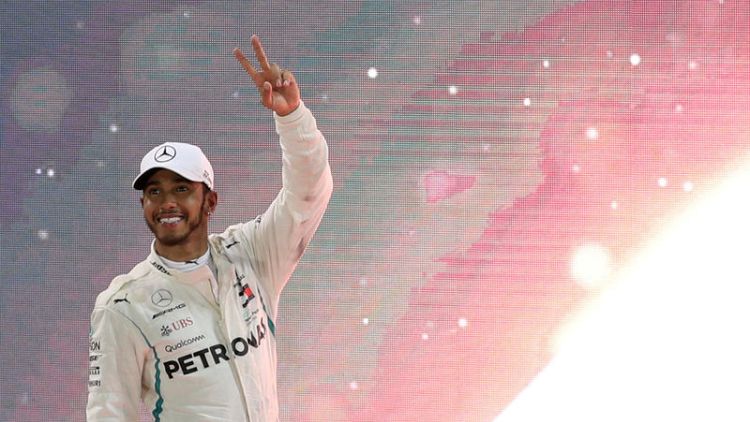 Hamilton hungry for more as new Mercedes makes track debut