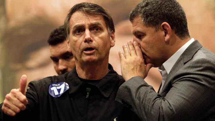 Brazil's Bolsonaro confronts cabinet scandal as pension debate nears
