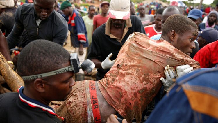 Zimbabwean rescuers pull out eight trapped miners alive