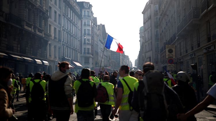 French police fire tear gas as latest 'yellow vest' protests turn violent