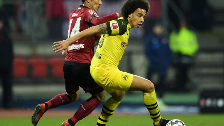 Dortmund slip up again with draw at bottom club Nuremberg