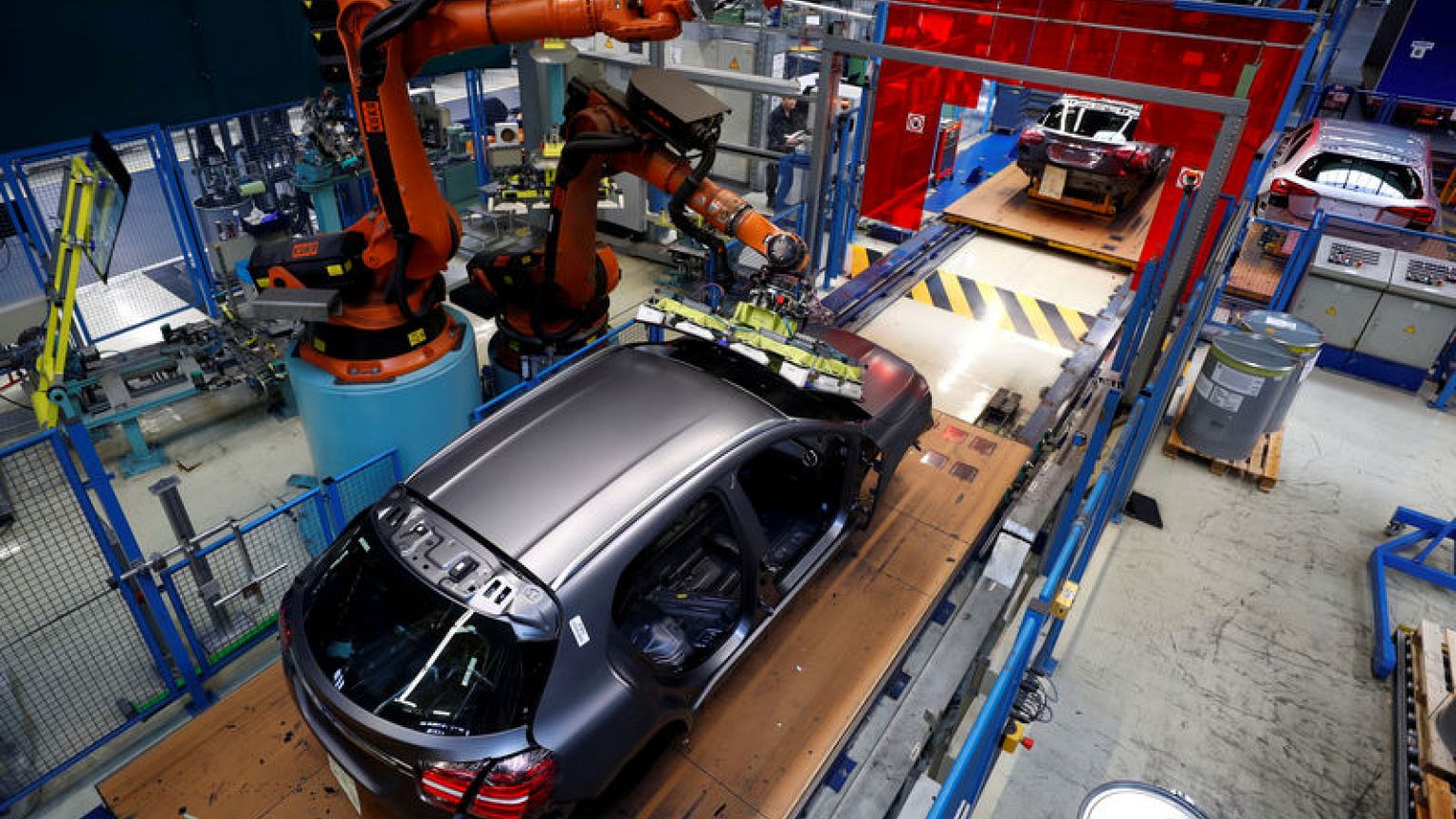 Slack demand, car woes cause Germany's industry share to slip