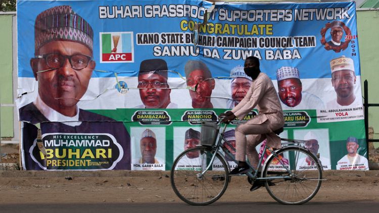 Nigeria's Buhari promises security for delayed presidential election