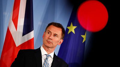 "Disgusting" that Venezuela's Maduro would close borders to aid, says UK