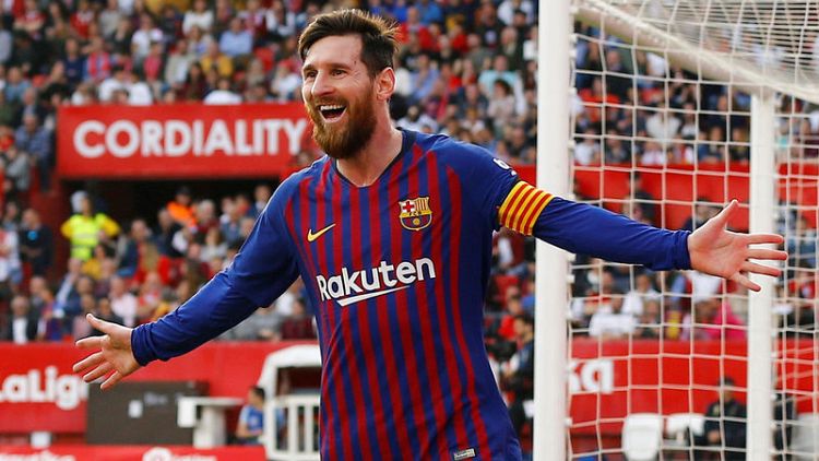Messi hits half century of hat-tricks to down Sevilla