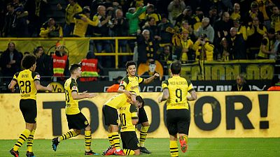 Dortmund back to winning ways by edging Leverkusen 3-2
