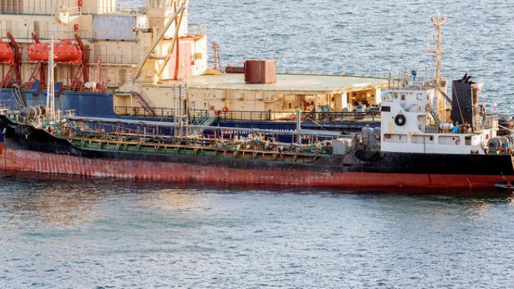 Exclusive: Despite sanctions, Russian tanker supplied fuel to North Korean ship-crew members