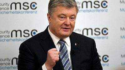 Ukraine leader's associate quits in corruption probe ahead of vote