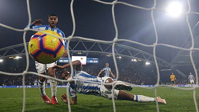 Late Mounie goal gives Huddersfield rare win