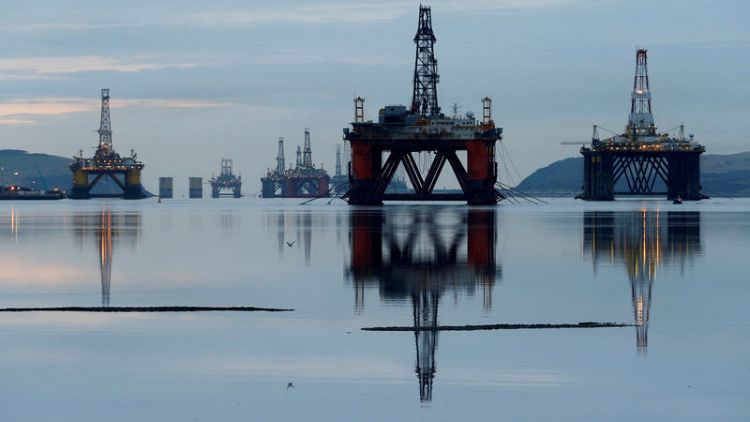 Oil rises on OPEC-led supply cuts, report of falling U.S. crude inventories