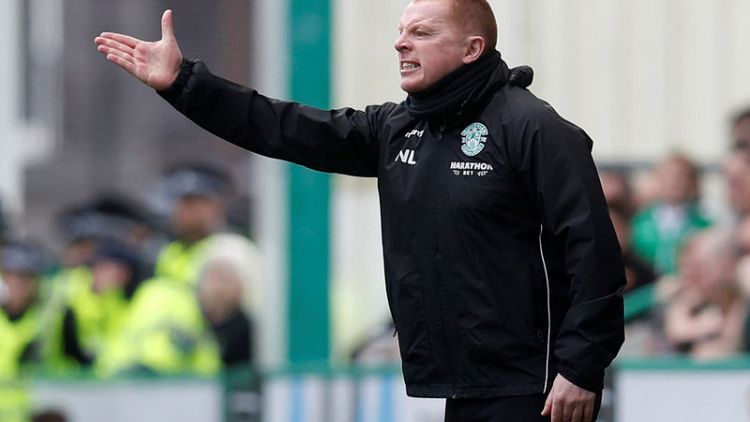 Celtic give Lennon winning start with late strike at Hearts