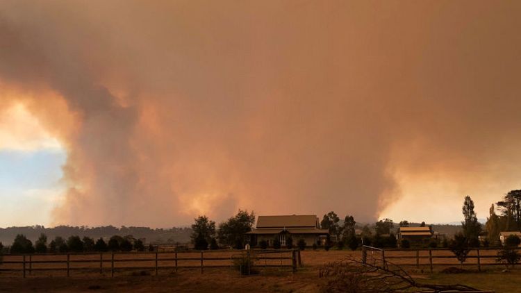 Record Australian heat brings fire to a scorched land