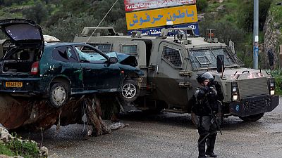 Car rams into Israeli troops, Palestinian attackers killed - military Car rams into Israeli troops, Palestinian attackers killed - military