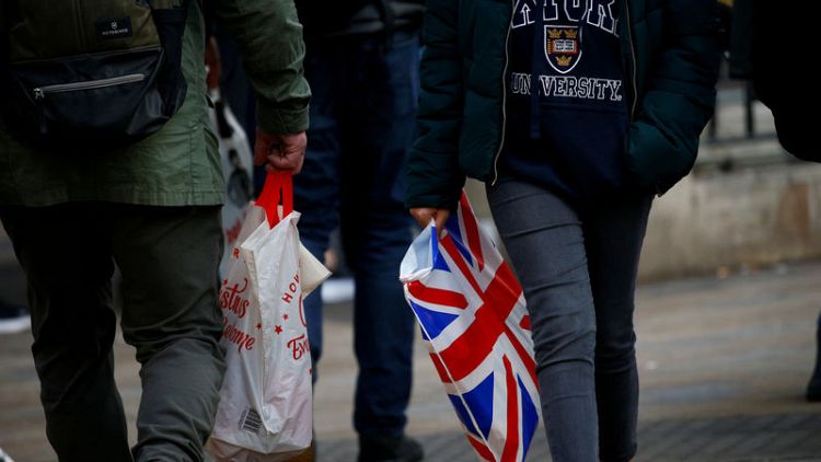 UK shoppers slow their spending ahead of Brexit, some stockpile