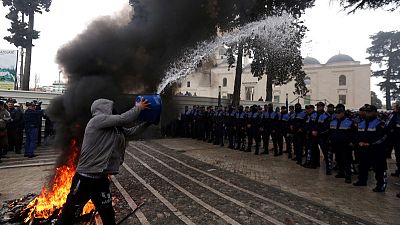 Albanian opposition urges snap election as protesters rally outside parliament Albanian opposition urges snap election as protesters rally outside parliament
