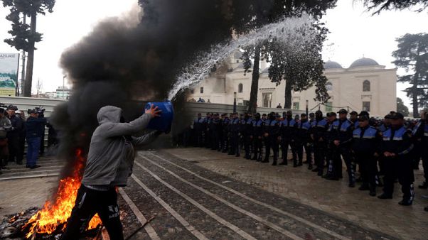 Albanian opposition urges snap election as protesters rally outside parliament Albanian opposition urges snap election as protesters rally outside parliament
