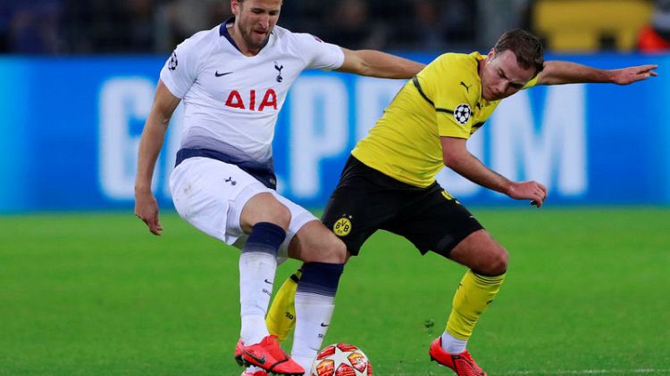 Kane scores in Dortmund as Tottenham stroll into last eight