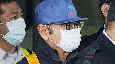 In cap and mask, ousted Nissan boss Ghosn leaves Japan jail after $9 million bail In cap and mask, ousted Nissan boss Ghosn leaves Japan jail after $9 million bail