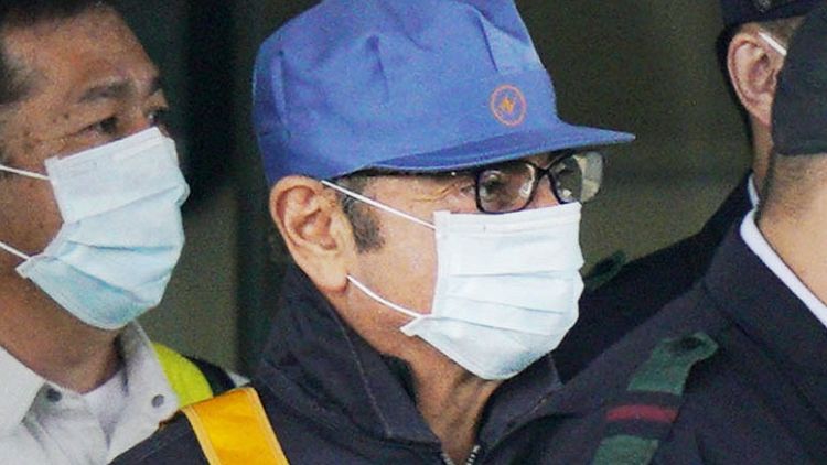 In cap and mask, ousted Nissan boss Ghosn leaves Japan jail after $9 million bail