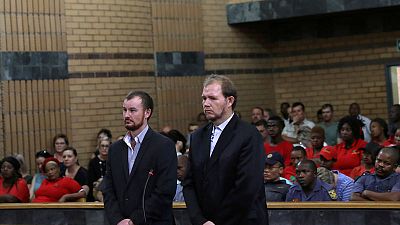 South African court jails two white farmers for killing black teenager South African court jails two white farmers for killing black teenager