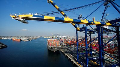 Tariffs, government shutdown weigh on still-growing economy - Fed Tariffs, government shutdown weigh on still-growing economy - Fed