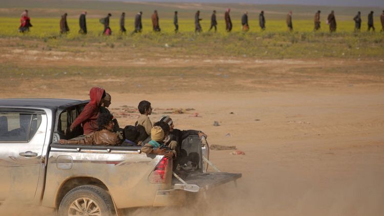 Waves of people still leaving Islamic State's last Syrian enclave