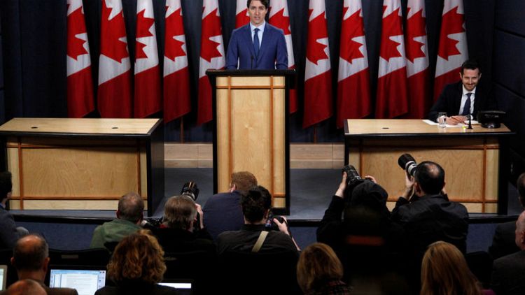 Under pressure, Canada's Trudeau denies impropriety, offers no apology