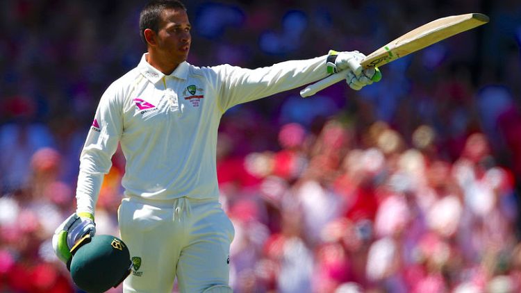 Khawaja ton helps Australia stay alive in India series