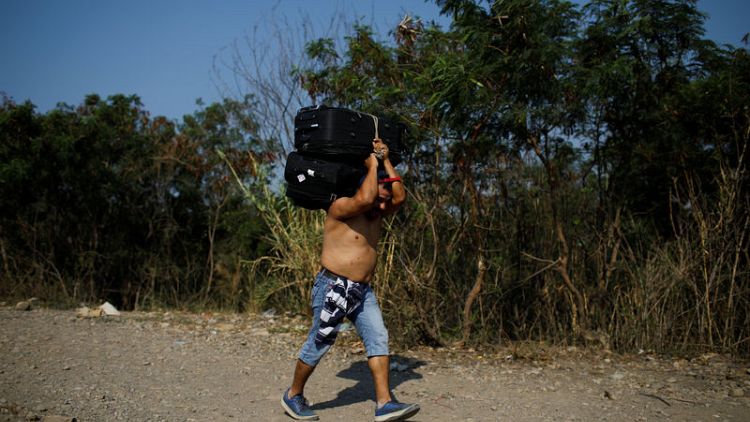 Nearly quarter-million Venezuelans sought asylum in 2018, UNHCR says