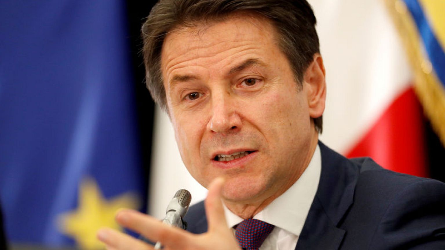 Italy PM says is working to try to end sanctions against Russia