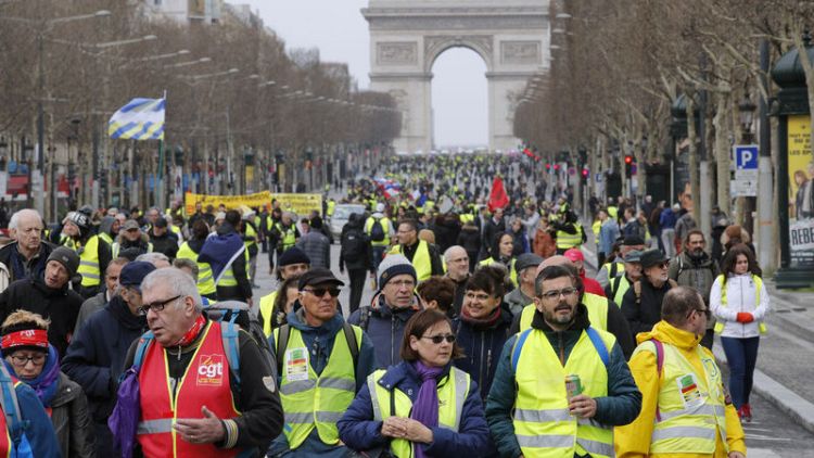 Hundreds march in Paris as childminders join 'yellow vest' protests