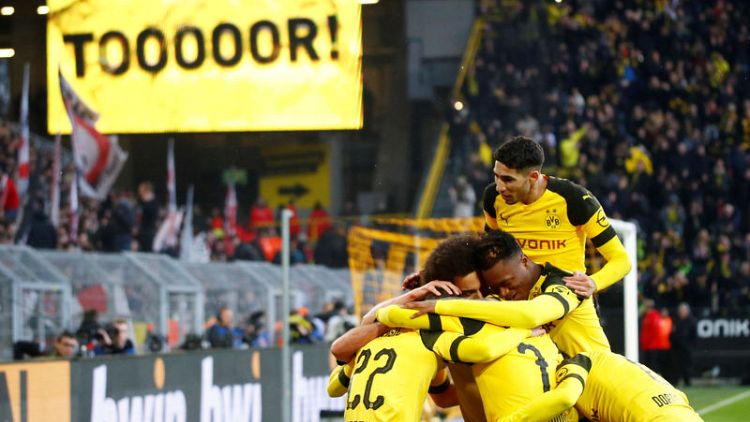 Dortmund drop to second despite 3-1 win over Stuttgart