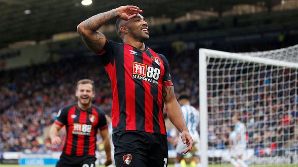 Bournemouth end losing run to pile more misery on Huddersfield Bournemouth end losing run to pile more misery on Huddersfield