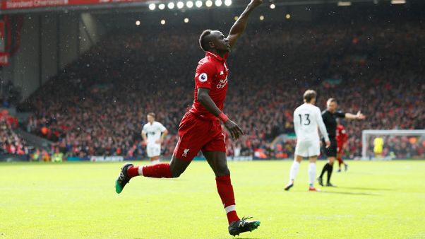 Firmino and Mane sink Burnley to keep Liverpool in the race Firmino and Mane sink Burnley to keep Liverpool in the race