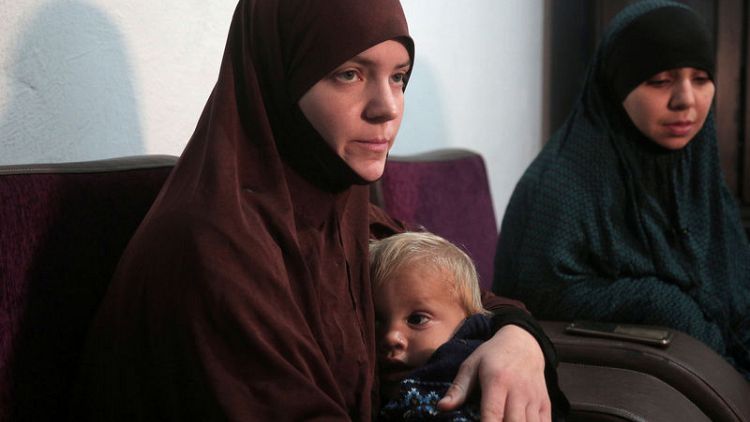 Exclusive: Two Belgian women, renouncing Islamic State, fear kids will never go home
