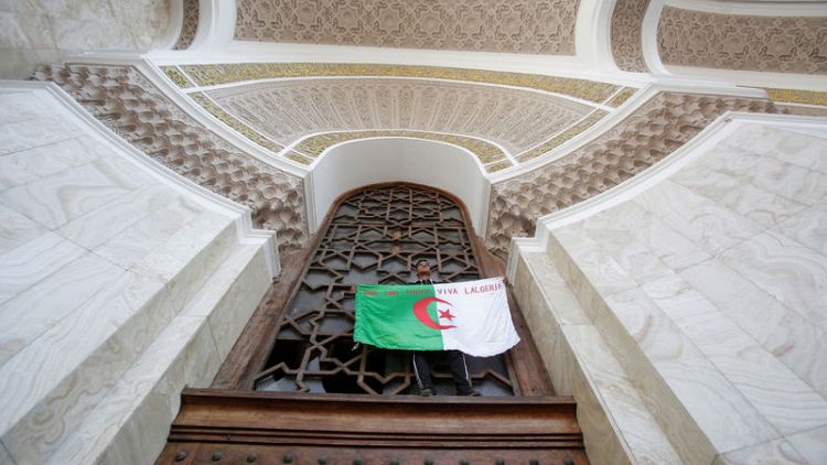 Hungry for change, Algerians press old guard to step aside
